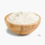 Harina de avena Integral en bowl de madera sobre fondo blanco